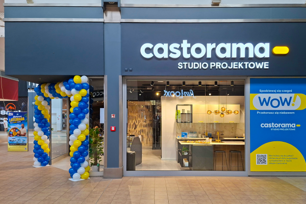 Grafika promująca otwarcie studio projektowe castorama w M1 Poznań. Zdjęcie studia projektowego castorama z zewnątrz.