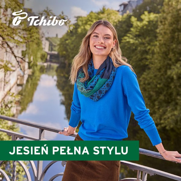 Tchibo promotional graphic. A blonde woman in a blue sweater stands on a bridge over a river on a sunny day.